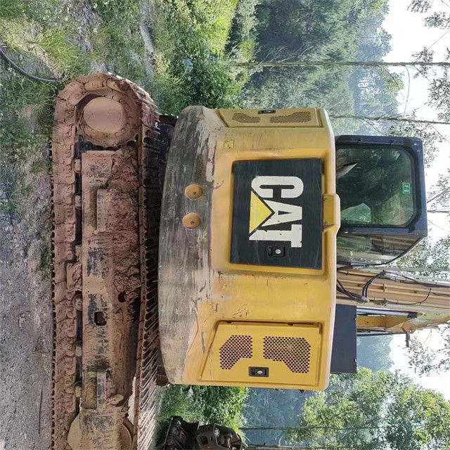 9.44 ton, neredeyse yeni, Japonya'dan ithal edilen, sürünen bir kazma makinesi, kullanılmış, yenilenmiş CAT 310