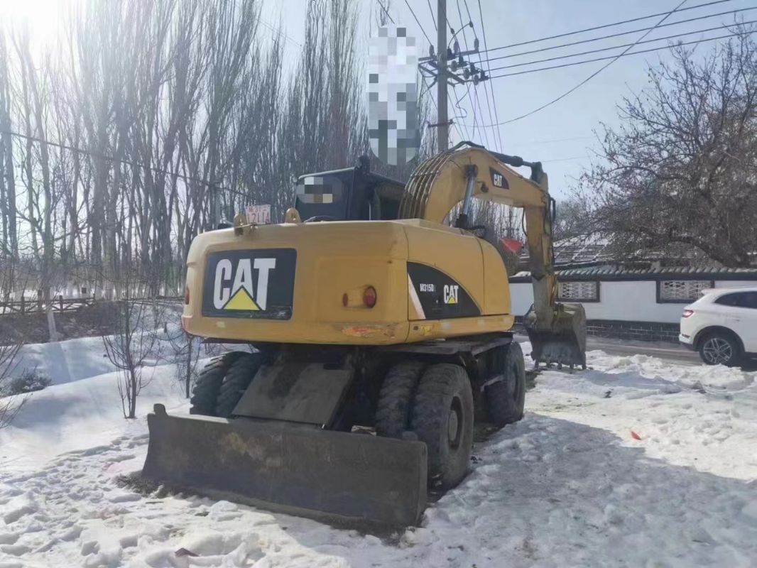 Çalışmaya hazır Caterpillar M315D Kullanılmış Tekerlekli kazıcı, kısa çalışma süresi ve iyi durumda