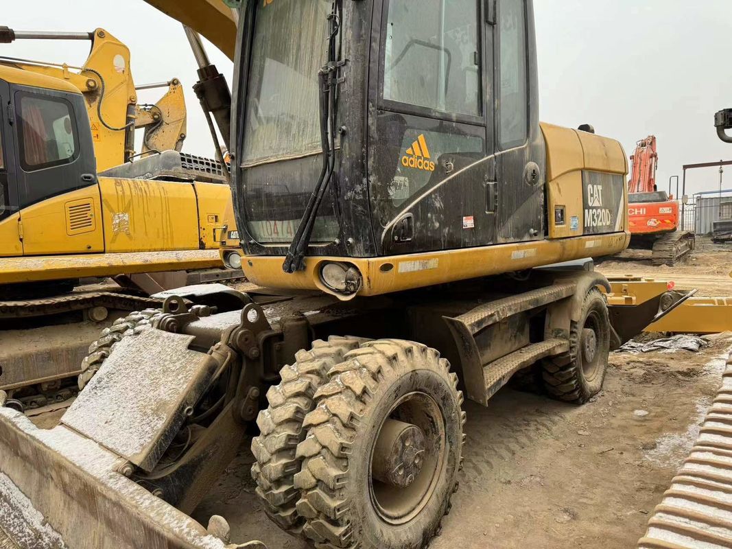 % 90 Caterpillar M317D2 Satış için yüksek kaliteli ve en iyi performanslı kullanılmış tekerlekli kazıcı