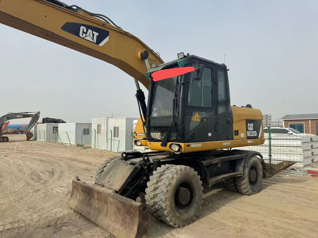 % 90 Caterpillar M317D2 Satış için yüksek kaliteli ve en iyi performanslı kullanılmış tekerlekli kazıcı