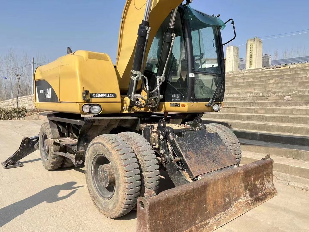 % 90 Caterpillar M317D2 Satış için yüksek kaliteli ve en iyi performanslı kullanılmış tekerlekli kazıcı